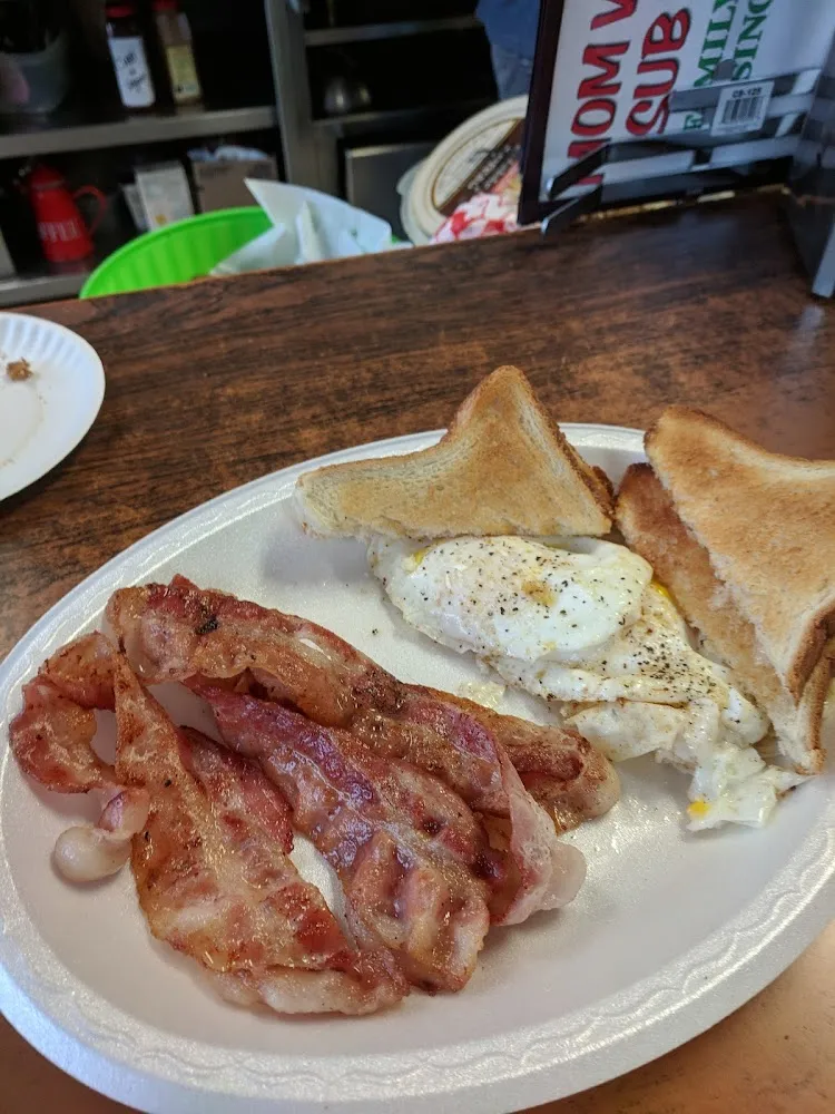 Bacon with Two Eggs over Easy and a Hash Brown